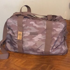 Victoria Secrets brown camo duffel bag.